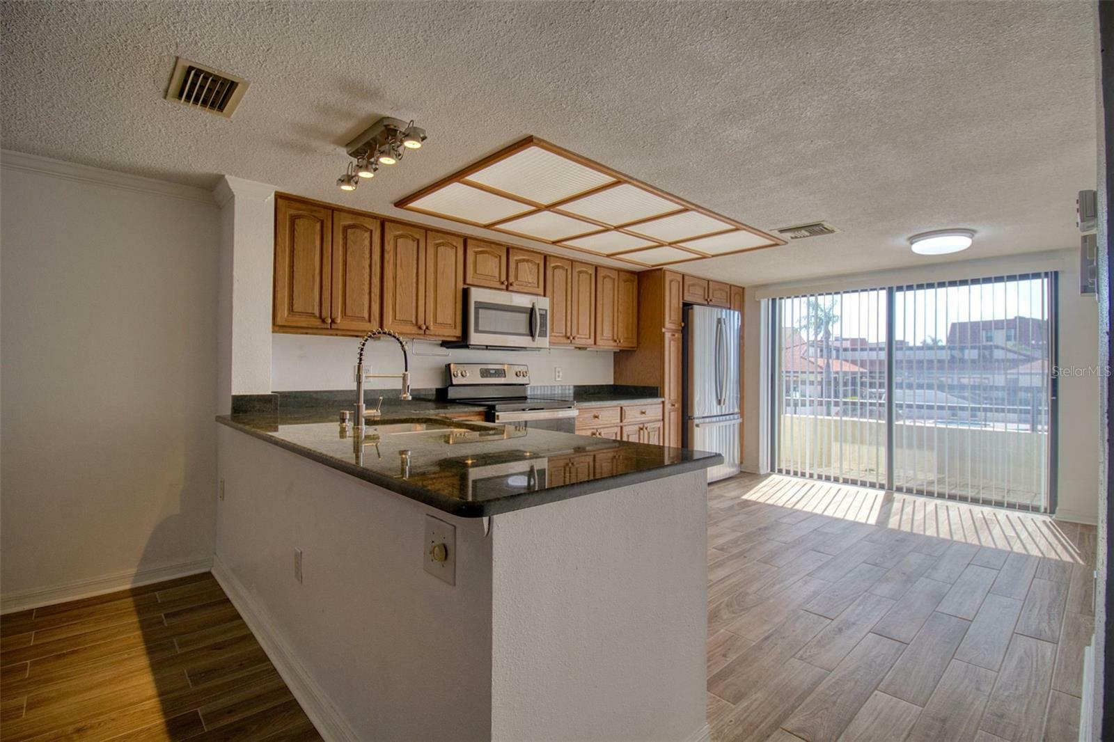 Property Photo: 128 1st Street E. 102 FL 33715