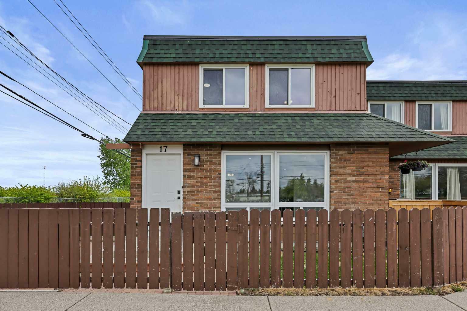 Property Photo: 11240 6 Street SW 17 AB T2W 1Z5