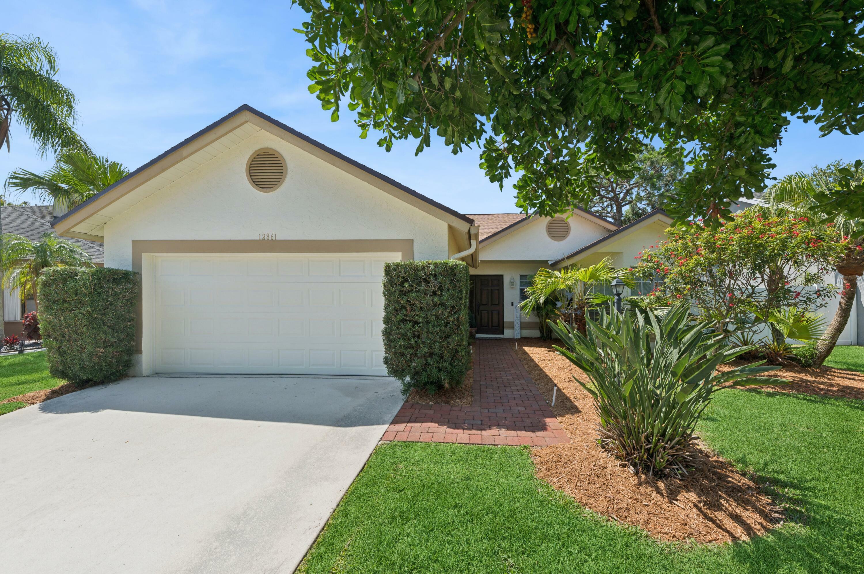 Property Photo: 12861 Meadowbend Drive FL 33414