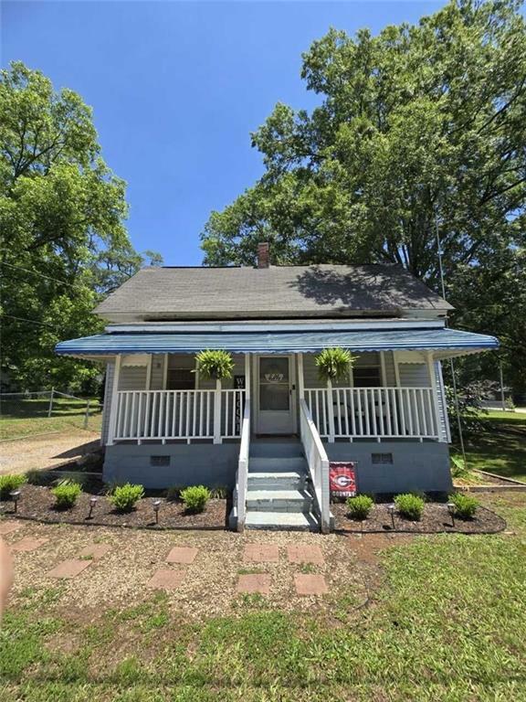 Property Photo:  5108 Hackett Street NE  GA 30014 