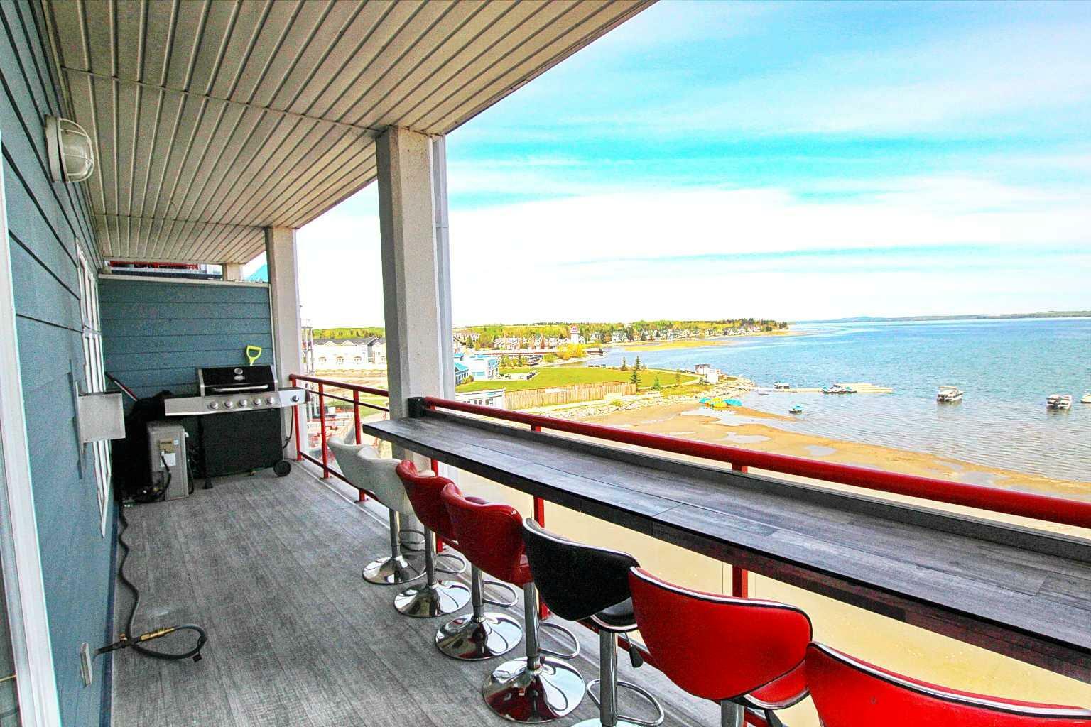 Property Photo: 5100 Lakeshore Drive 401 AB T4S 2L7