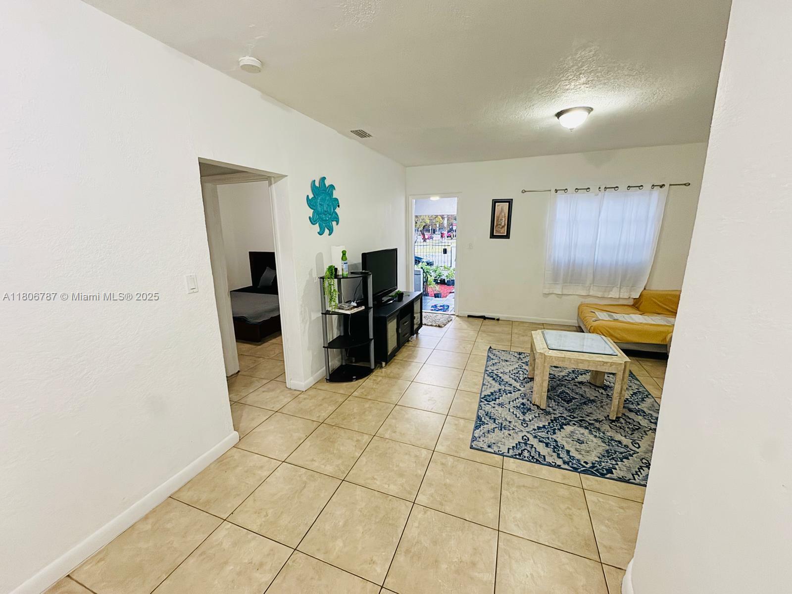 Property Photo: 301 NW 37th St FL 33127