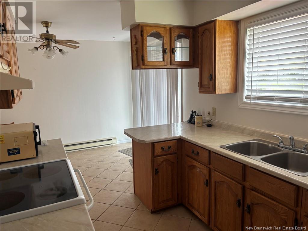 Property Photo: 2005 Balsam Avenue NB E2A 4X4