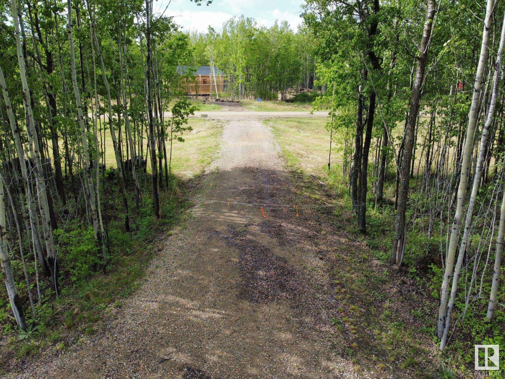 Property Photo: 205 473060 Rge Road 280 AB T0C 2C0