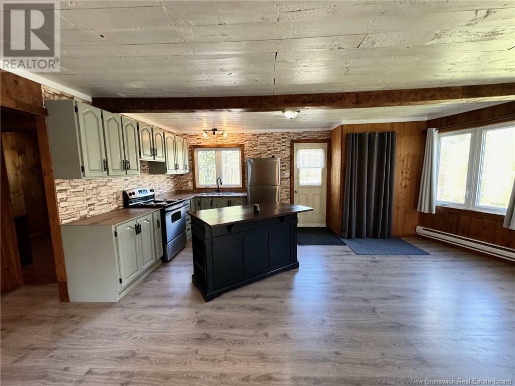 Property Photo: 590 Charlo Dam Road NB E8E 2T2