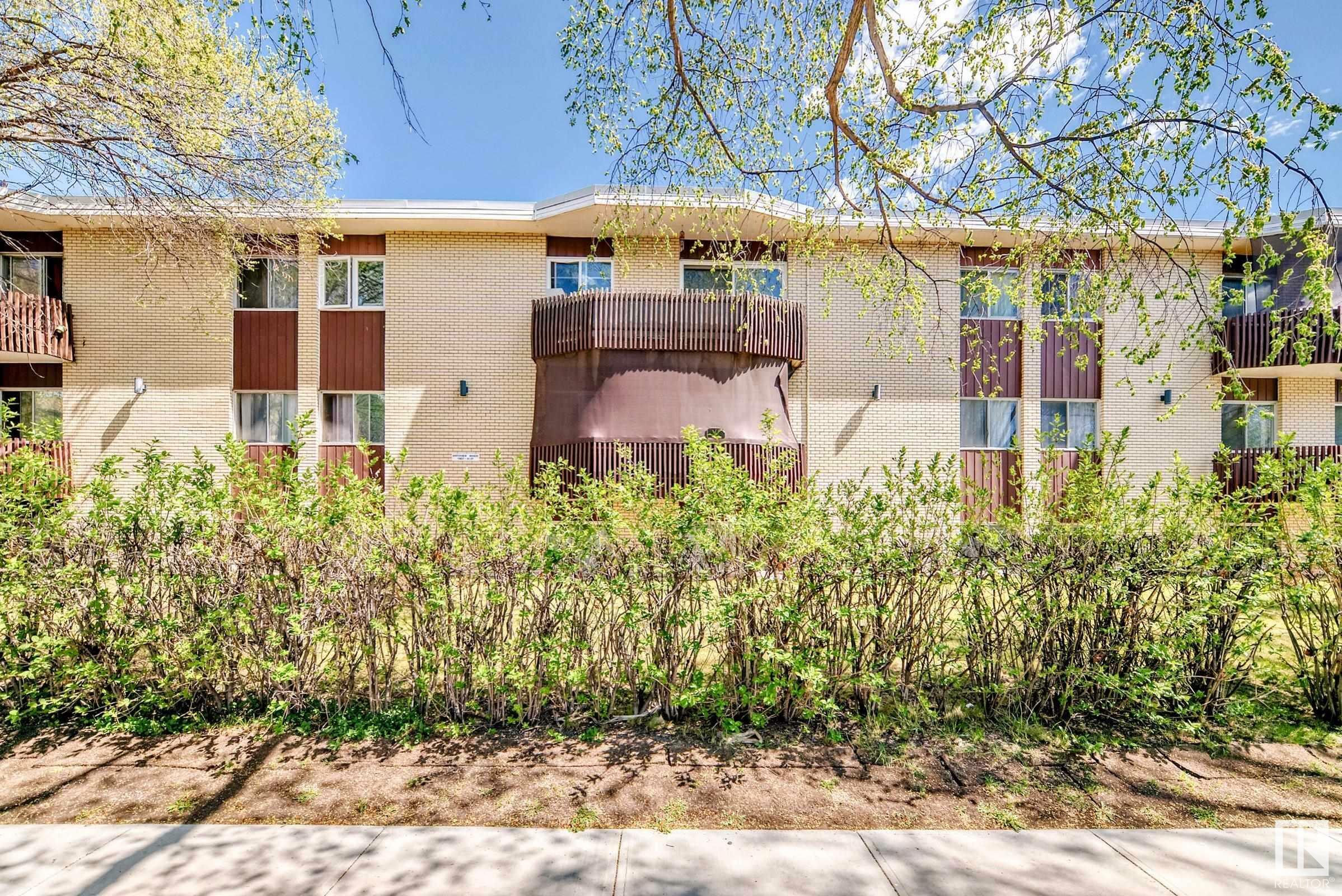 Property Photo: 11907 81 Street NW 207 AB T5B 2S7