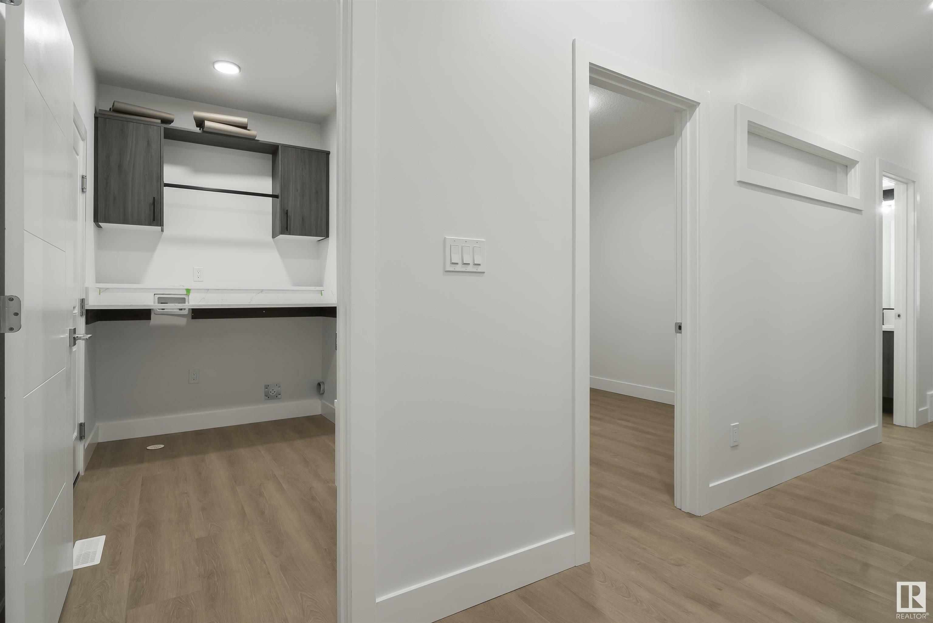 Property Photo: 104 Allard Link SW 22 AB T6W 2N2