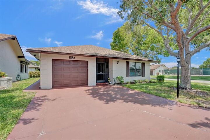 Property Photo:  1584 SW 22nd Ter  FL 33442