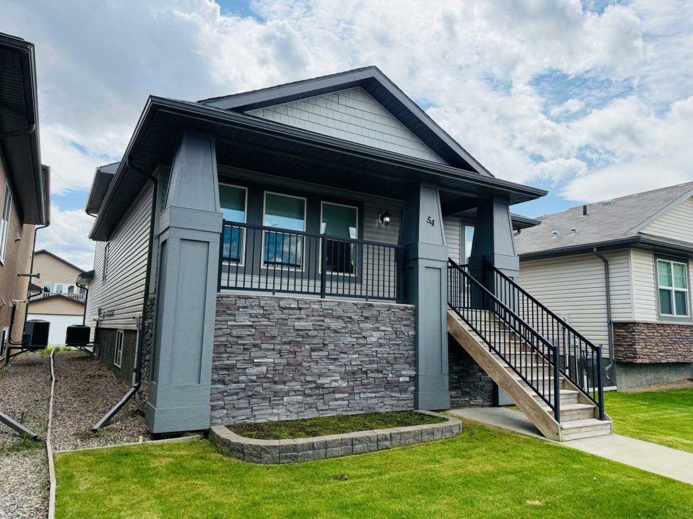 Property Photo: 54 Sunridge Boulevard W AB T1J 0T4