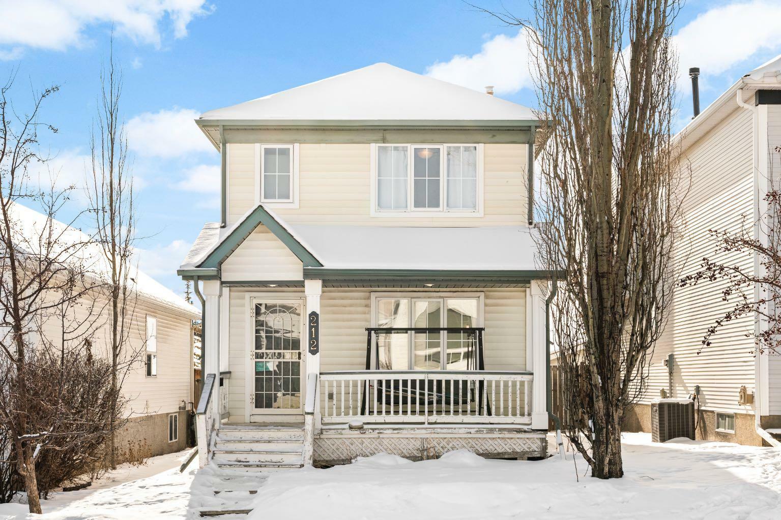 Property Photo:  212 Tuscany Valley Way NW  AB T3L 2A7 