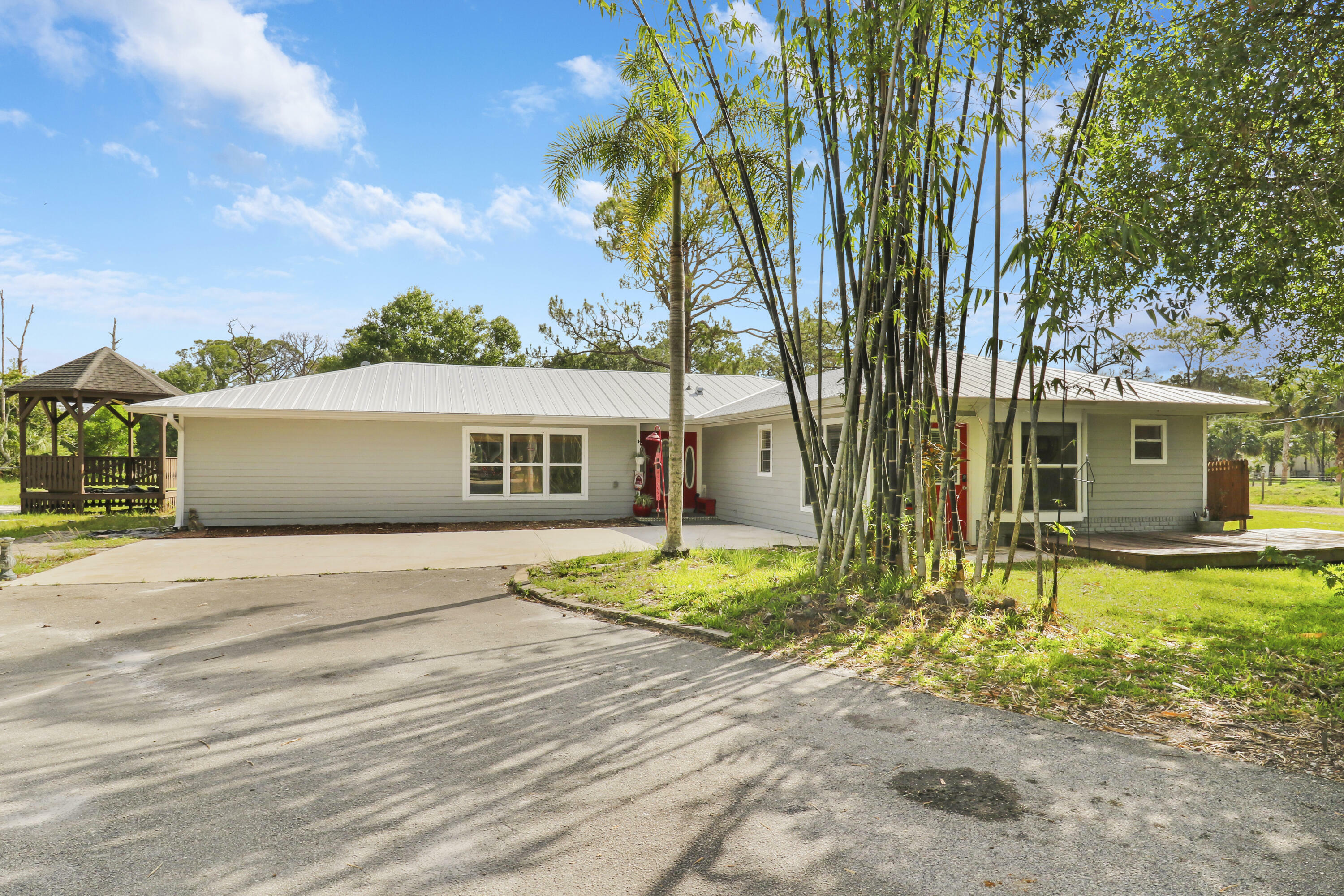 Property Photo: 4985 SW Ranchito Street FL 34990