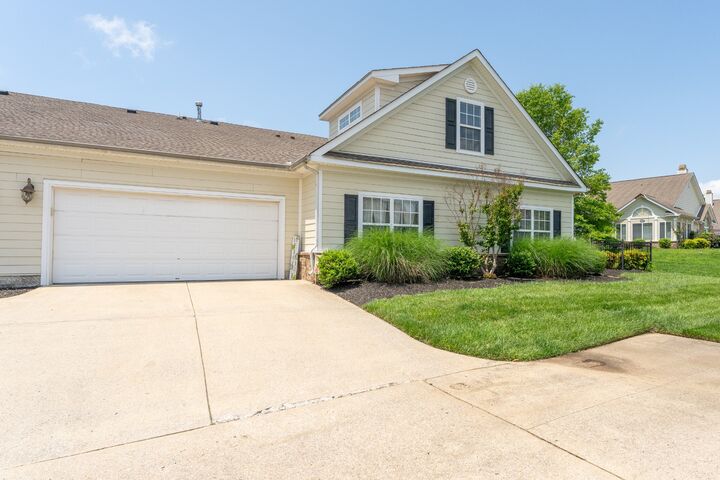 Property Photo: 825 S Browns Ln 1904 TN 37066