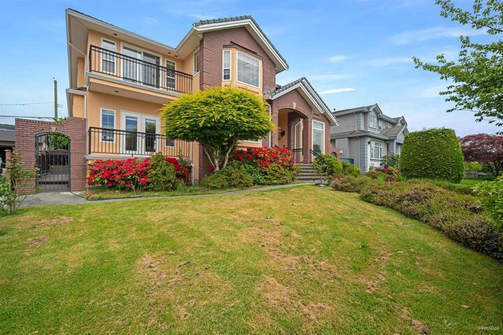 Property Photo:  6589 Kitchener Street  BC V5B 2J7 