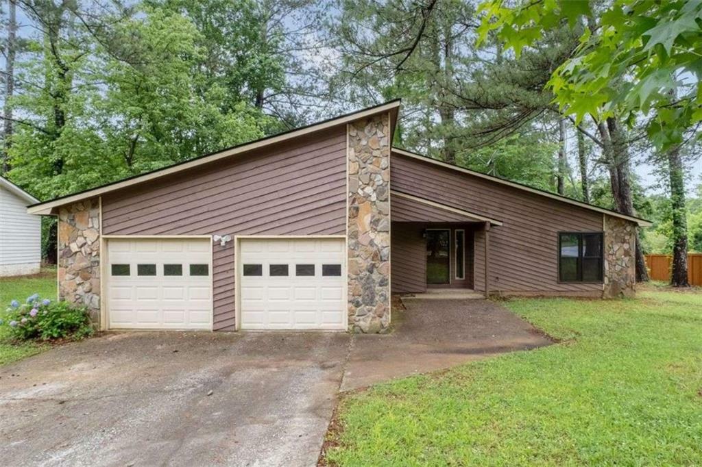 Property Photo:  9383 Woodknoll Way  GA 30238 