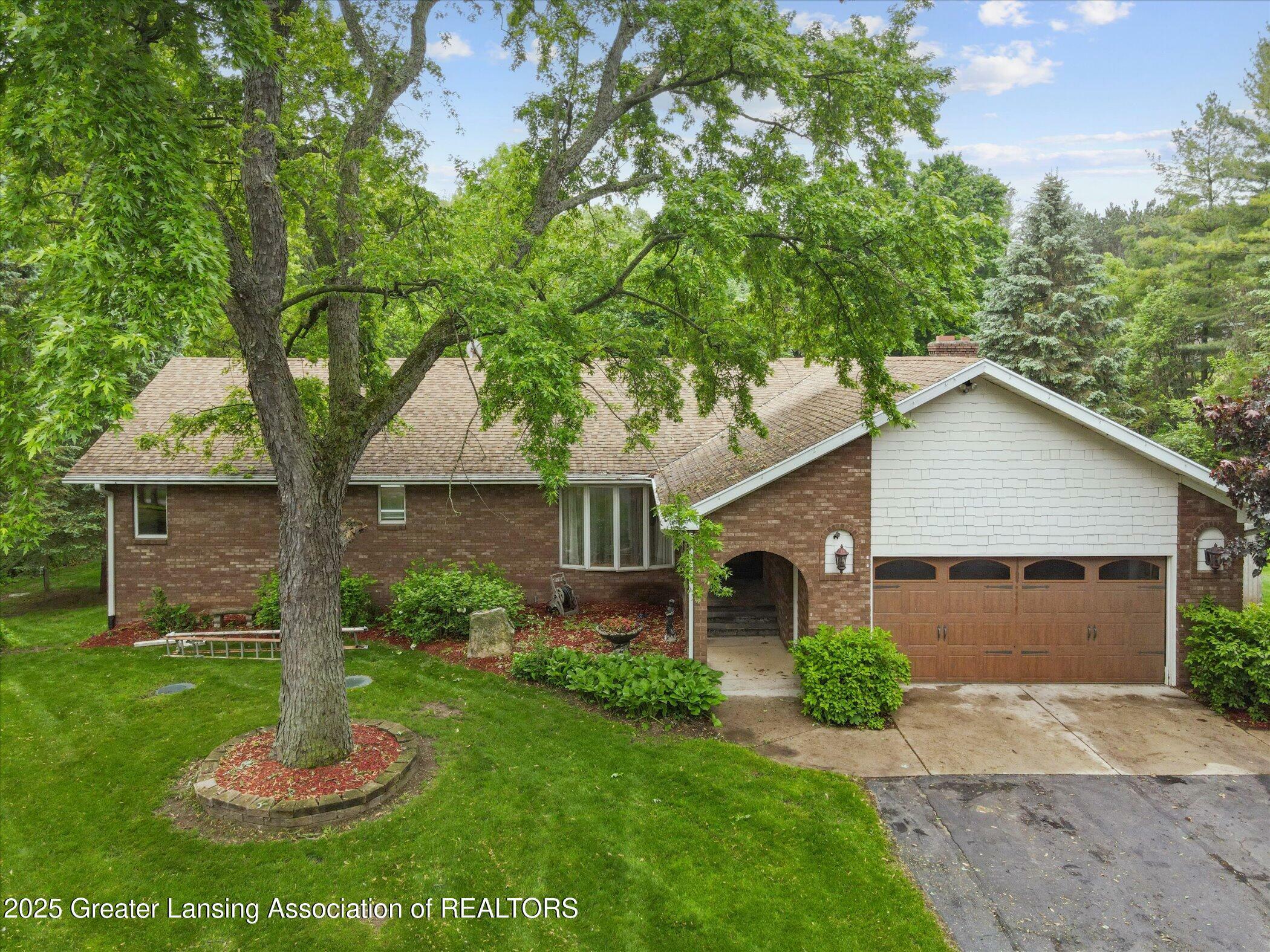 Property Photo:  1346 E Howe Road  MI 48820 