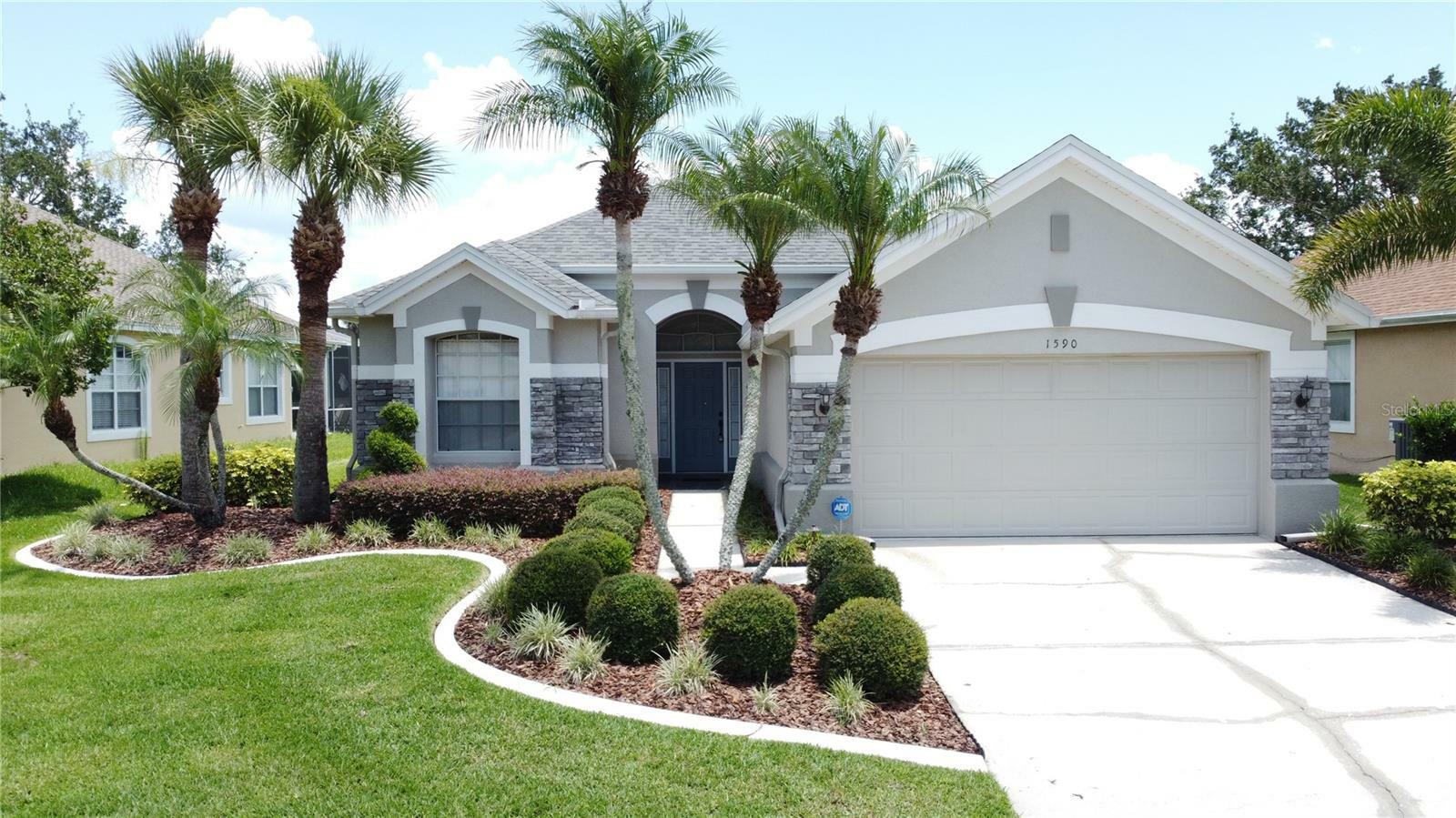 Property Photo: 1590 The Oaks Boulevard FL 34746