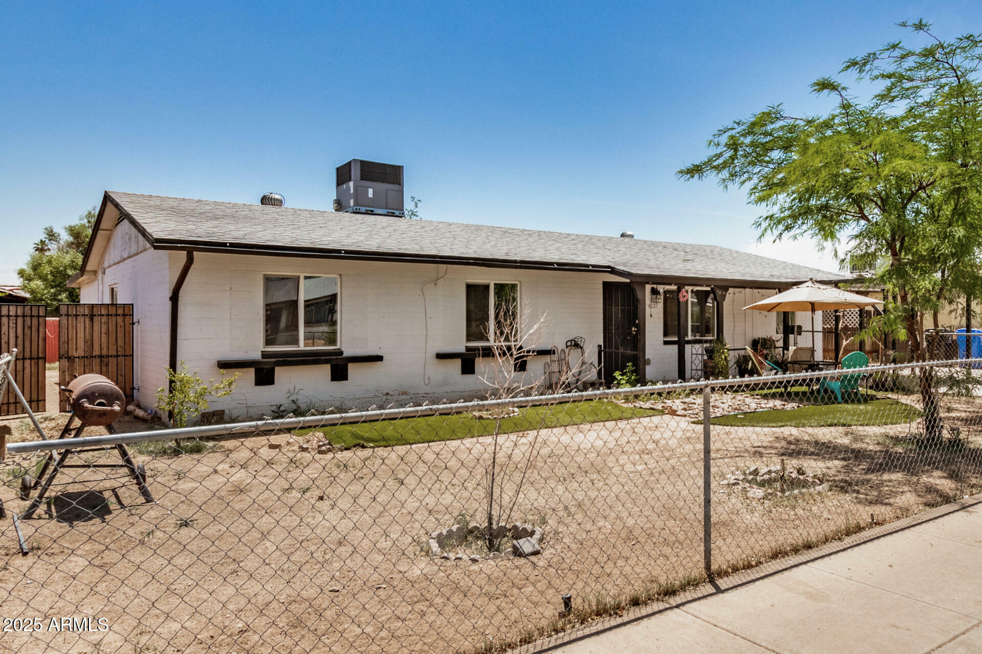 Property Photo: 6137 W Britton Avenue AZ 85033