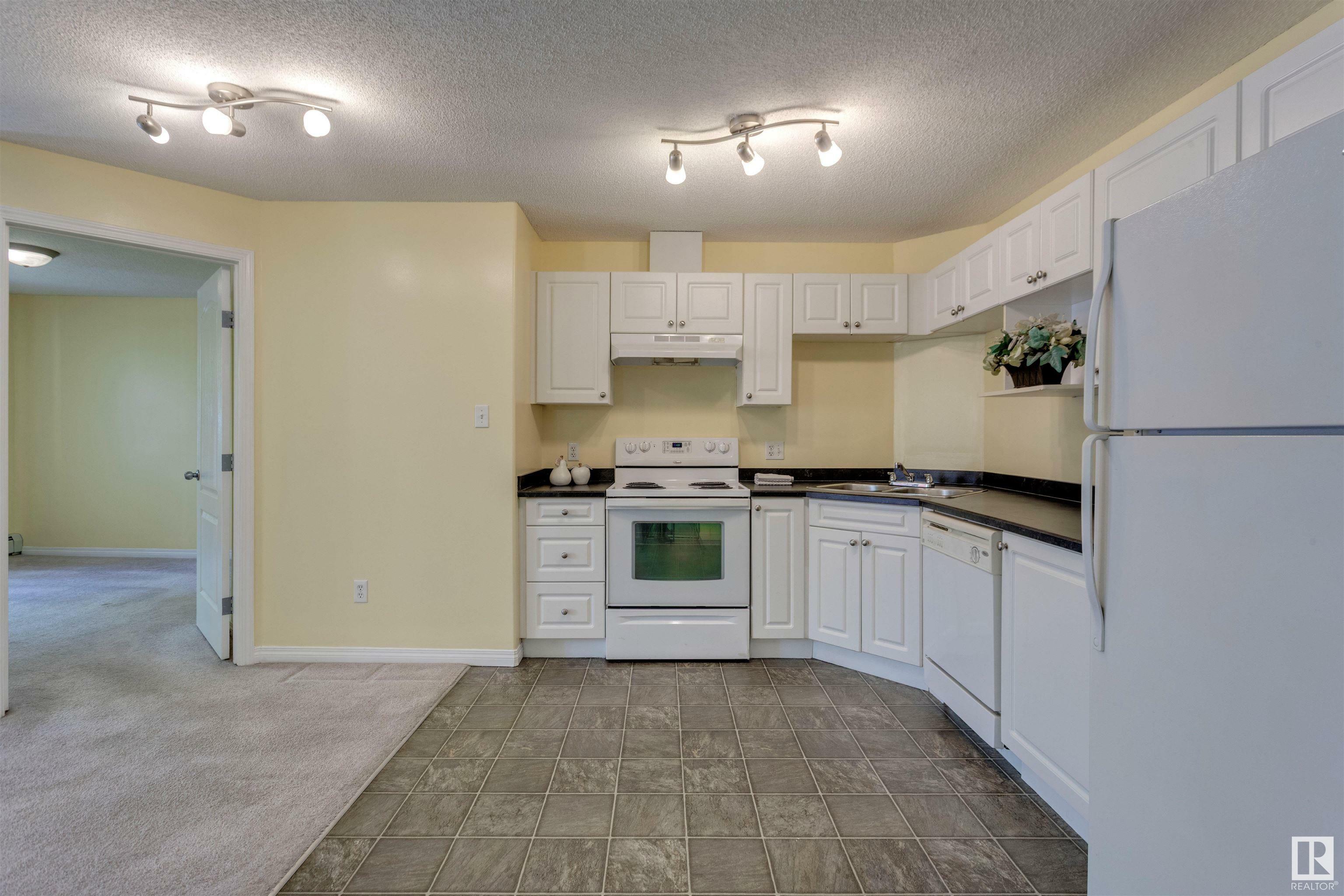 Property Photo: 320 Clareview Station Drive NW 2116 AB T5Y 0E5