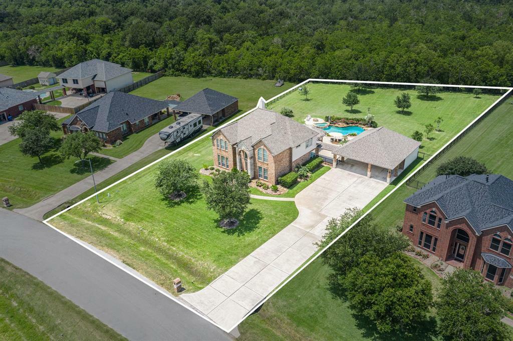 Property Photo: 9011 Tumblewood Drive TX 77523