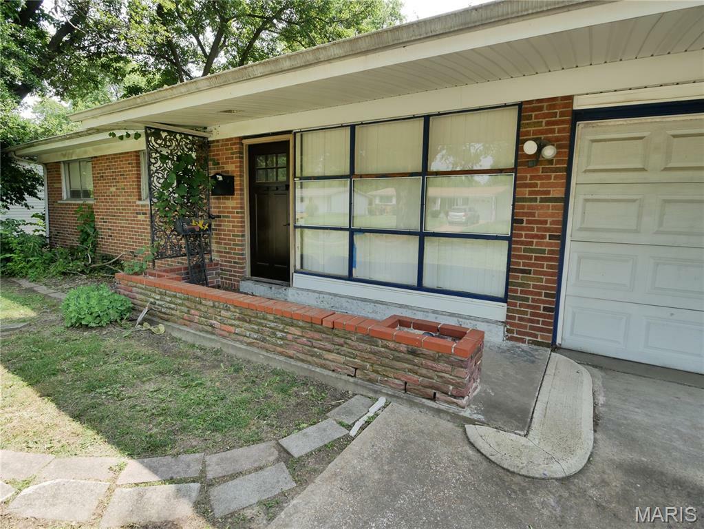 Property Photo: 10421 Canfield Drive MO 63136