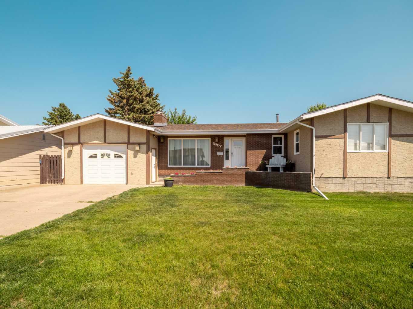 Property Photo: 5407 45 Street AB T1G 1G7