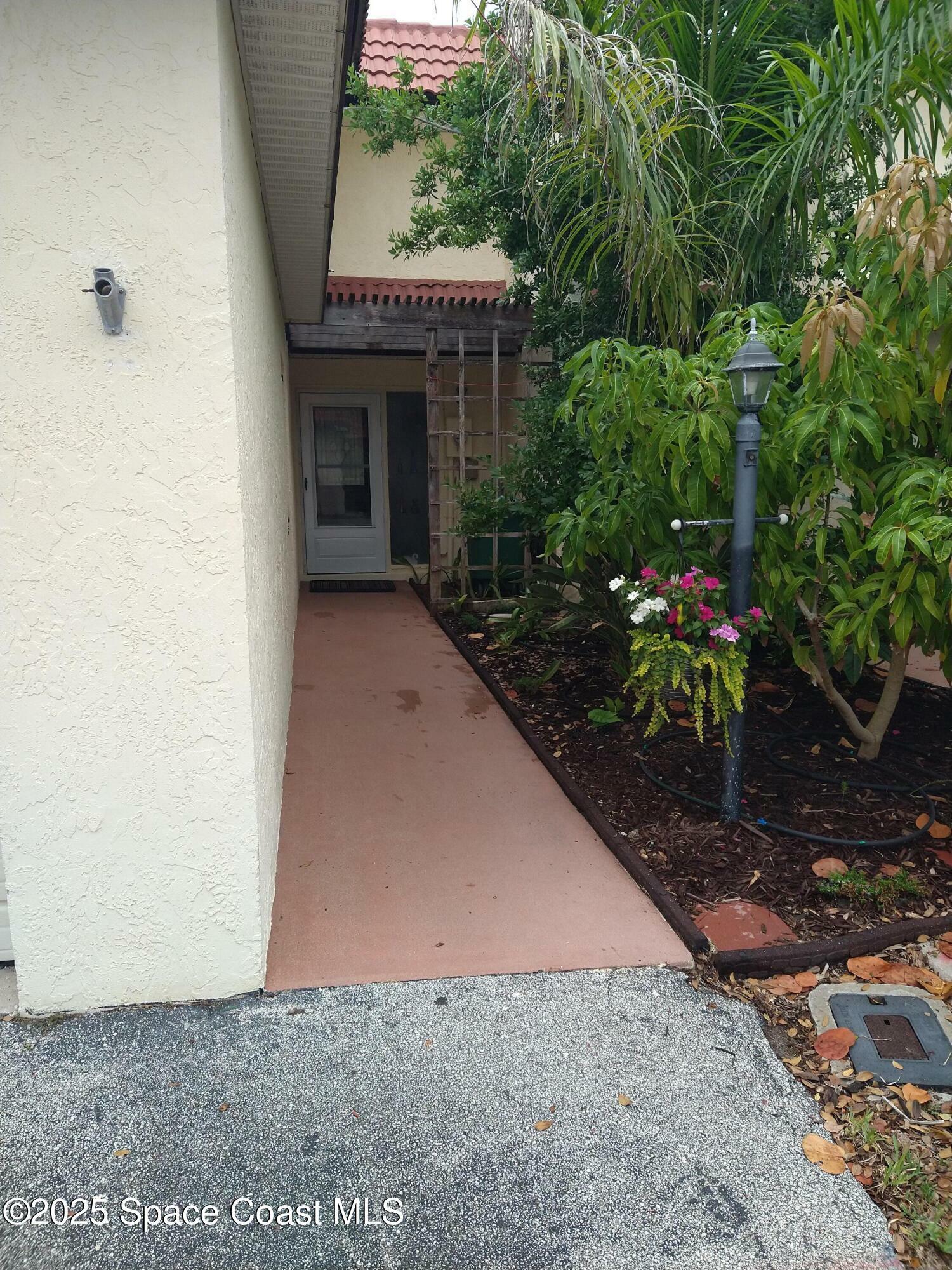 Property Photo: 8705 Hibiscus Court FL 32920