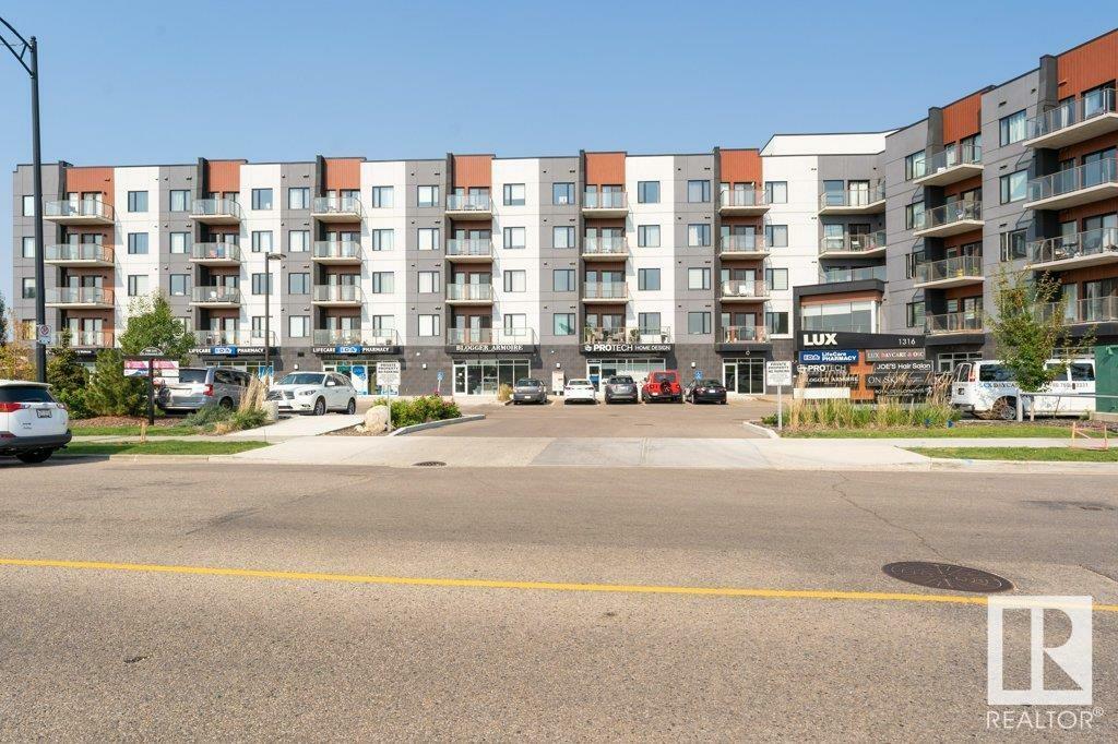 Property Photo: 1316 Windermere Way SW 306 AB T6W 2J3