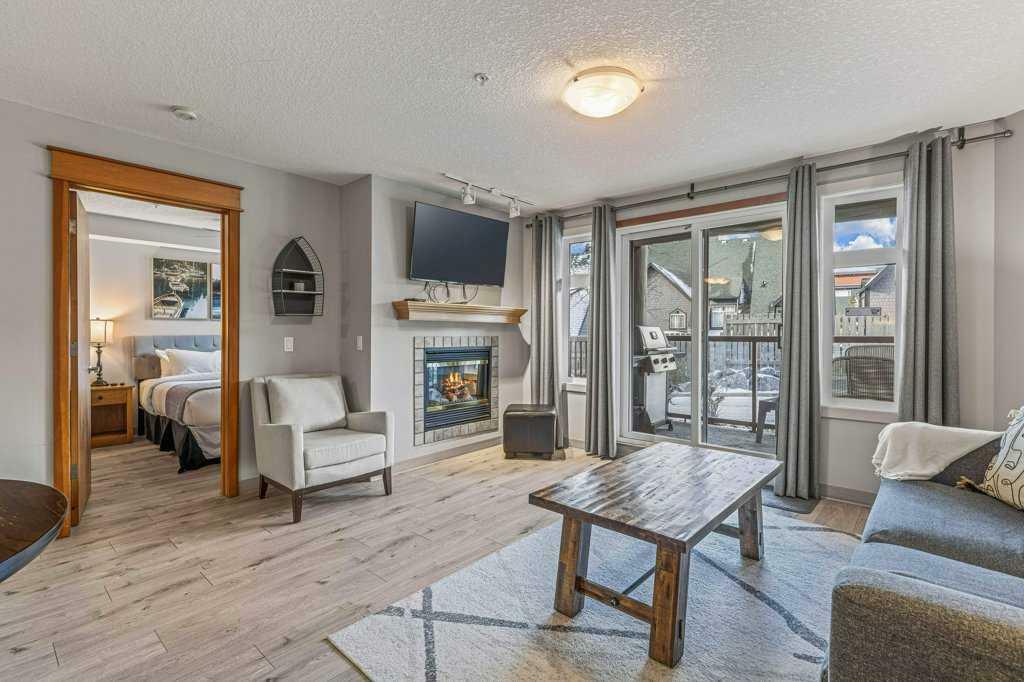 Property Photo: 160 Kananaskis Way 110 AB T1W 3E2