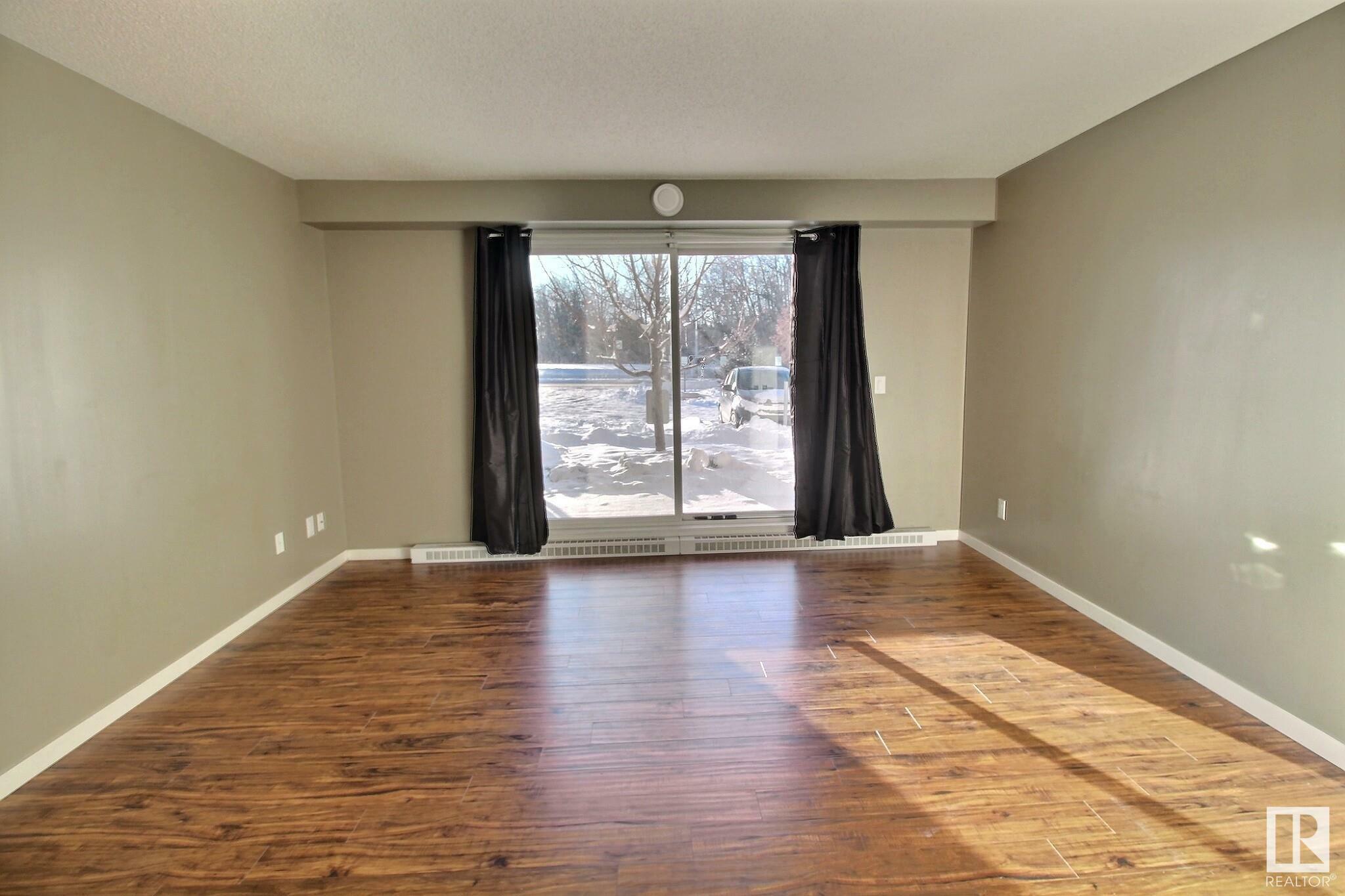 Property Photo: 610 Calahoo Road 103 AB T7X 1R1