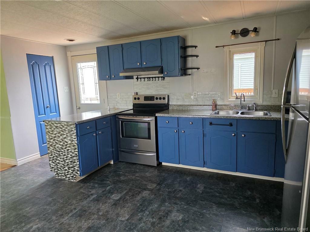 Property Photo: 15 Leslee Drive NB E3B 6W7
