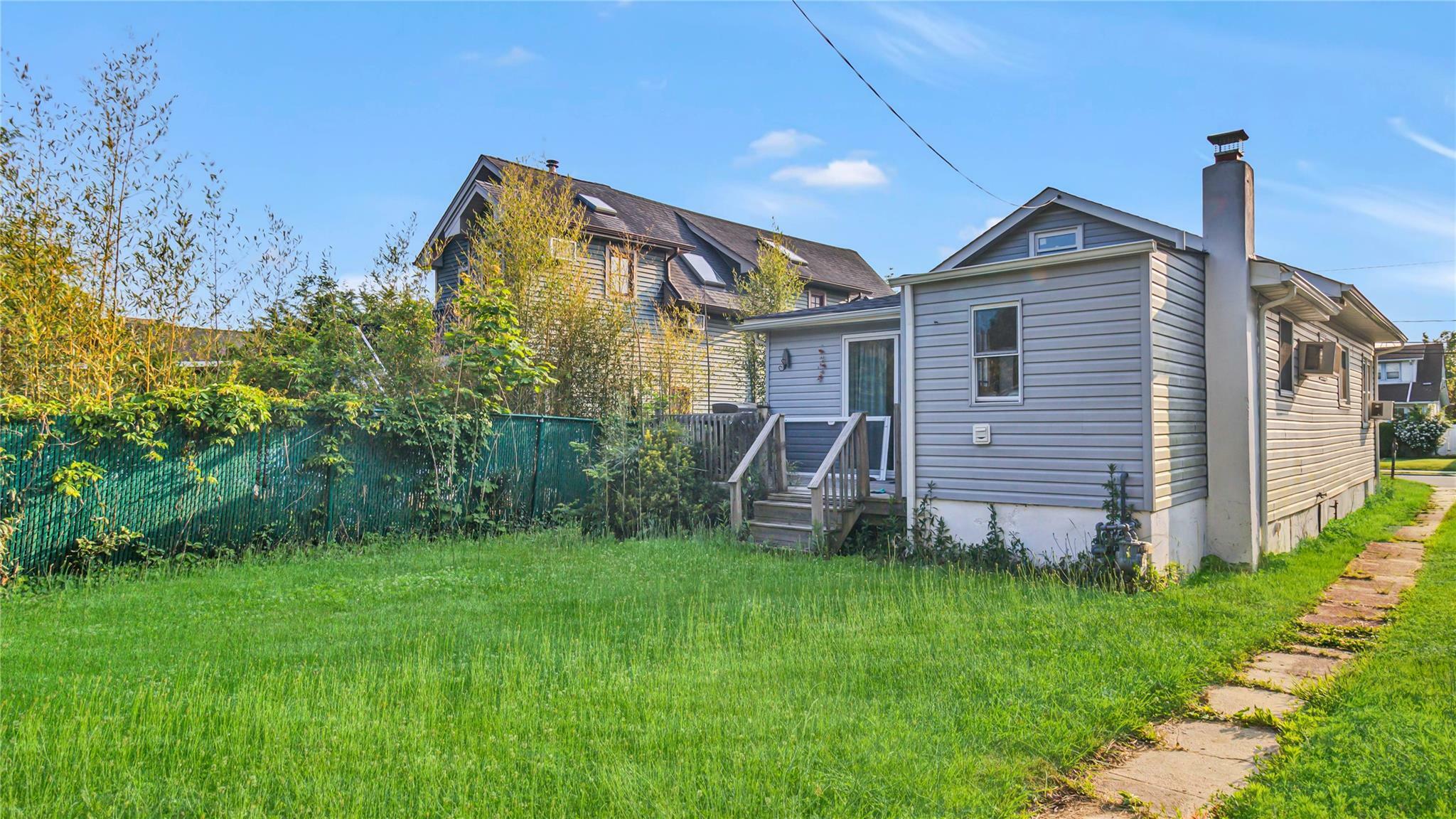 Property Photo: 9 E Hamilton Avenue NY 11758