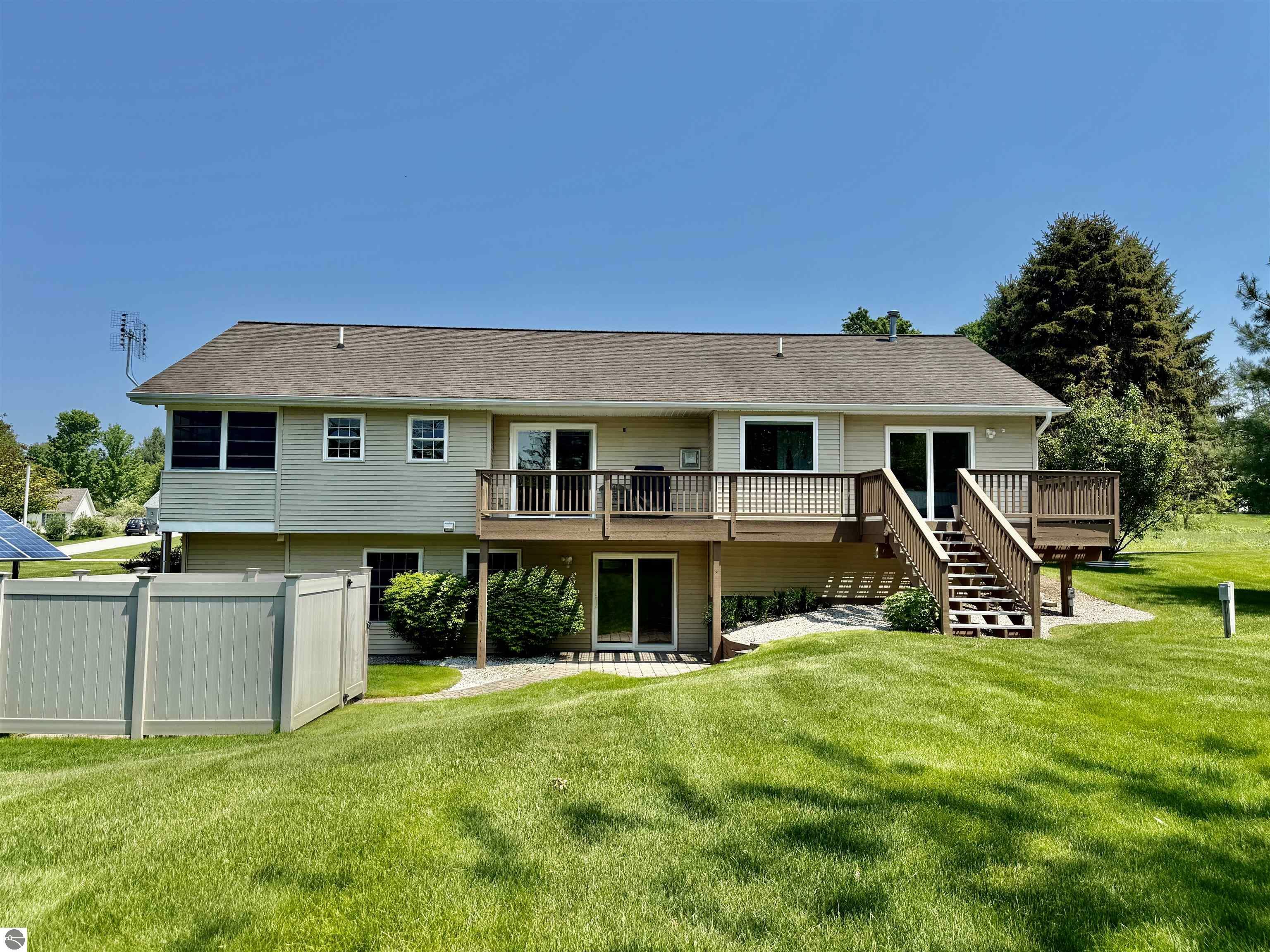 Property Photo:  8673 Sun Bay Court  MI 49690 
