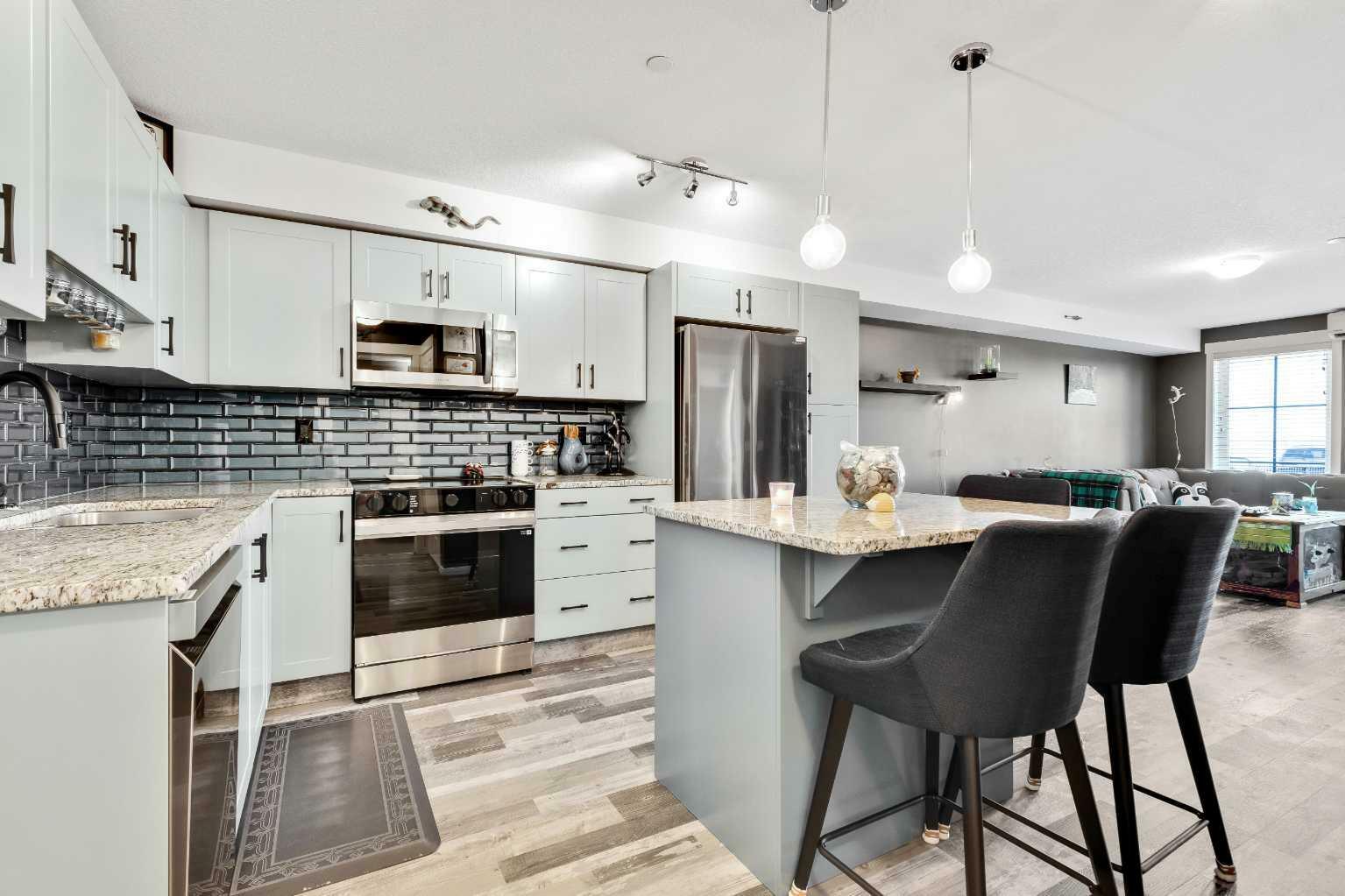 Property Photo: 755 Copperpond Boulevard SE 1108 AB T2Z 4R2