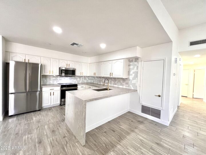 Property Photo:  1044 N Arvada -- N  AZ 85205 