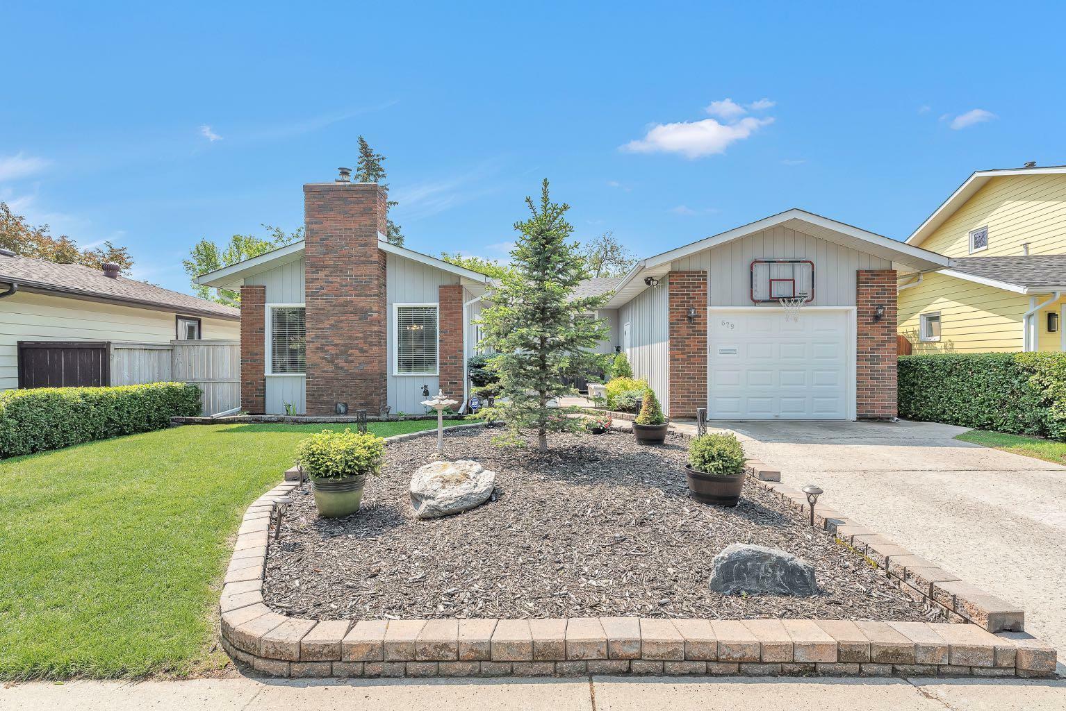 Photo de la propriété:  679 Queen Charlotte Drive SE  AB T2J 4T5 