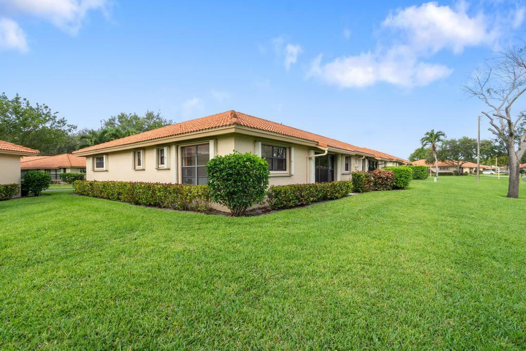 Property Photo: 9850 Bischofia Tree Way B FL 33436