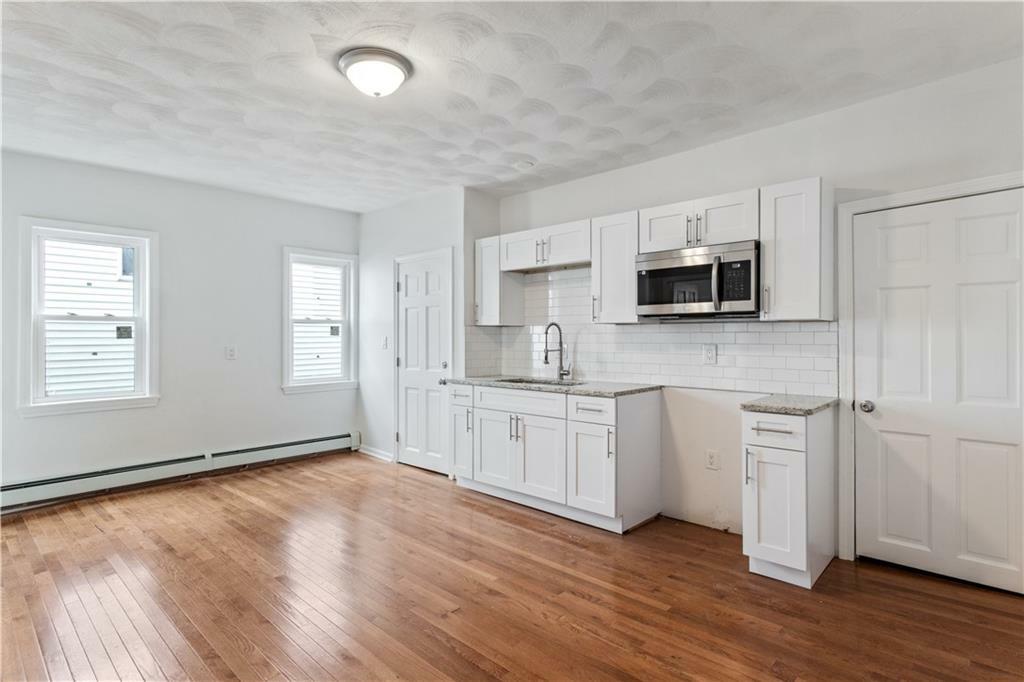 Property Photo: 416 Admiral Street 1R RI 02908