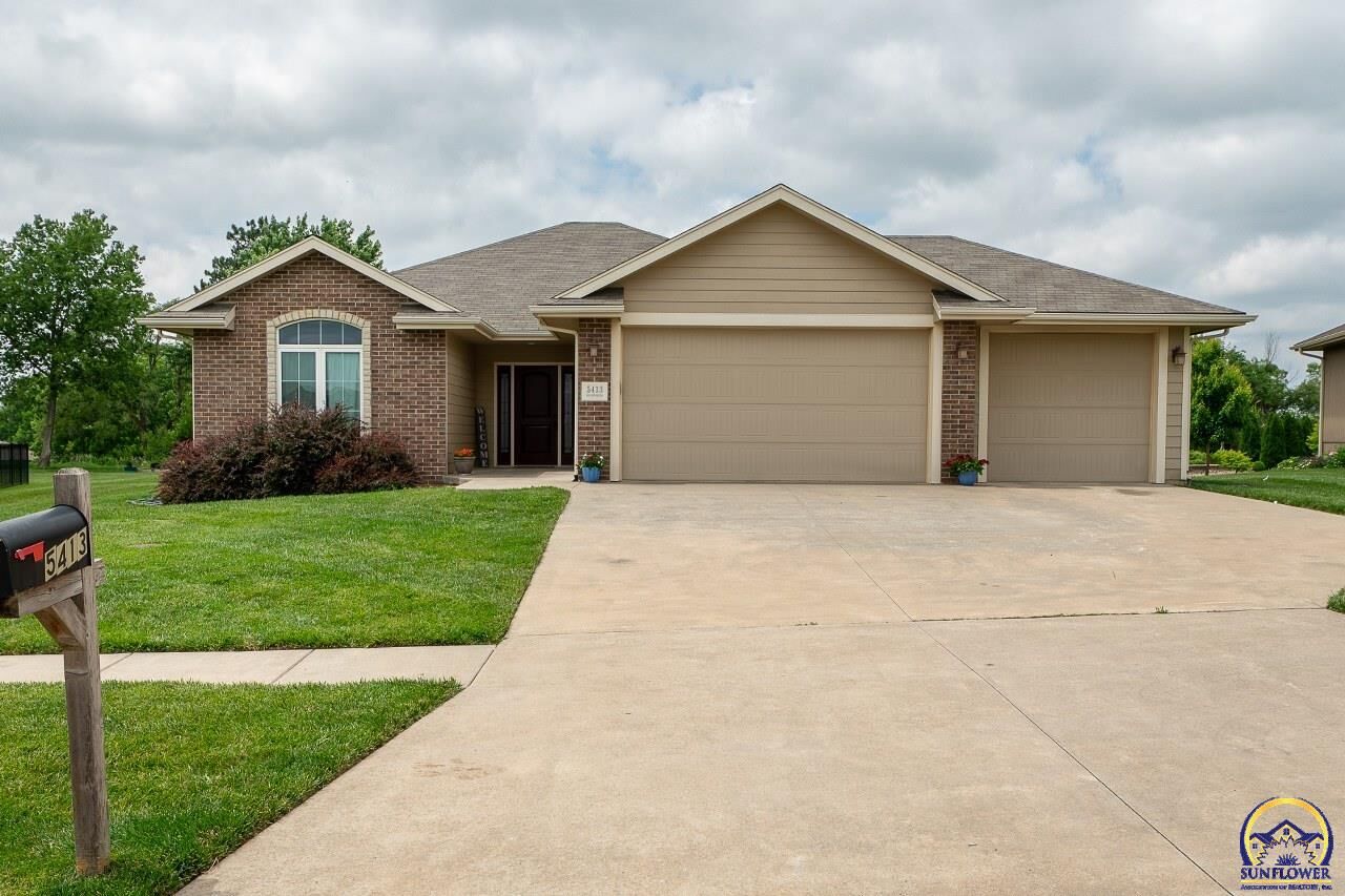 Property Photo: 5413 SW Westport Dr KS 66610