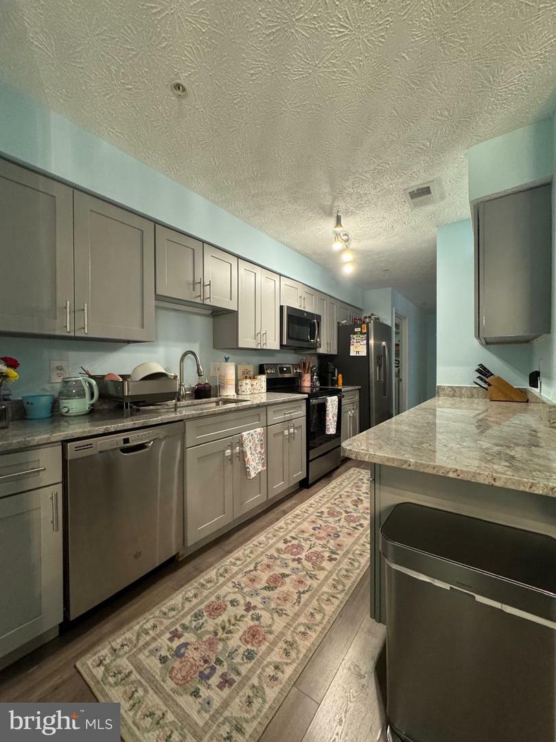 Property Photo: 3712 Excalibur Court 202 MD 20716