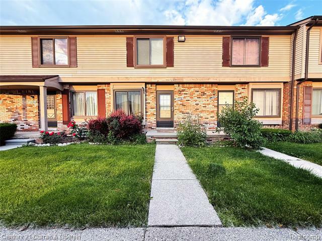 Property Photo: 17060 Kingsbrooke Drive 59 MI 48038