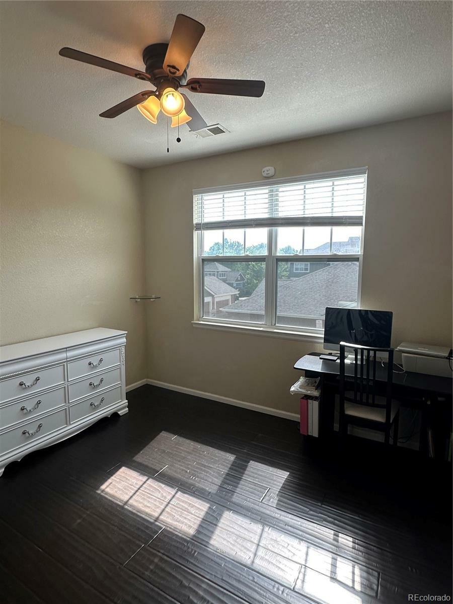 Property Photo:  7140 Simms Street 202  CO 80004 
