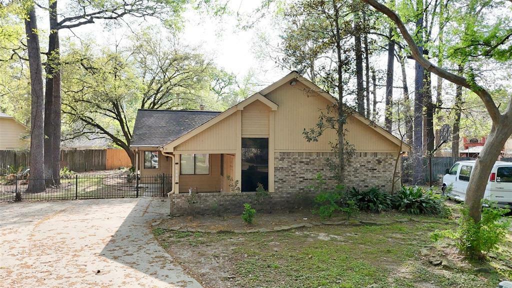 Property Photo: 1906 Woodhue Drive TX 77386