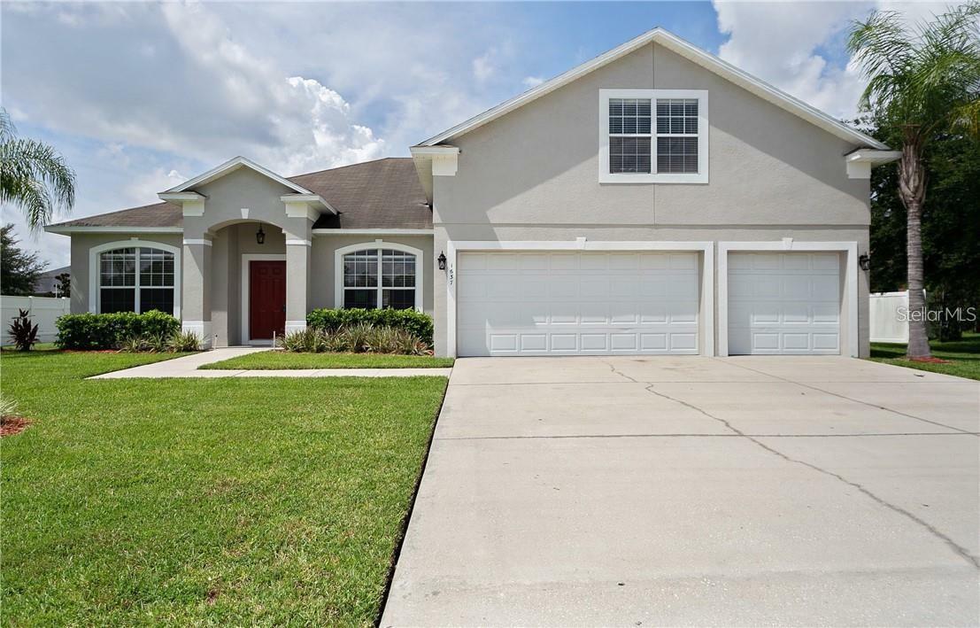 Property Photo: 1637 Mistflower Lane FL 34787