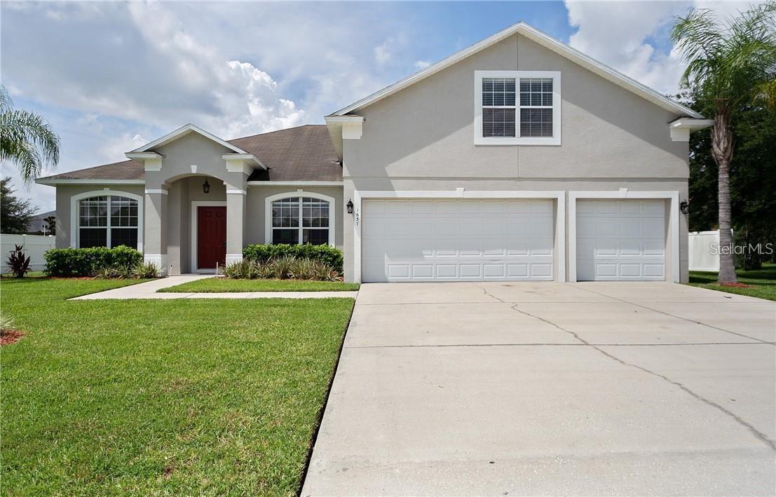 Property Photo: 1637 Mistflower Lane FL 34787