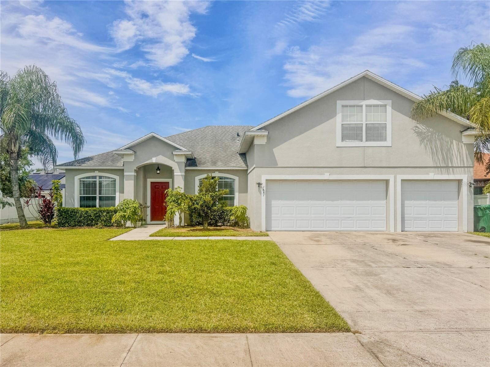 Property Photo: 1637 Mistflower Lane FL 34787