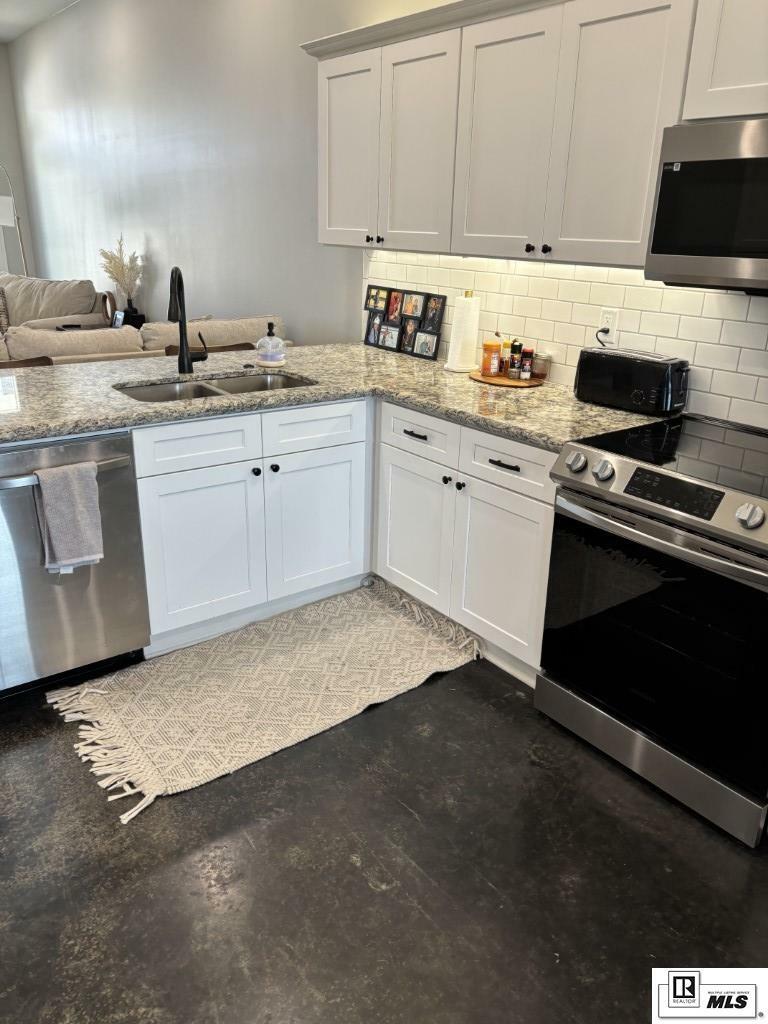 Property Photo: 138 Le Mans Loop LA 71280
