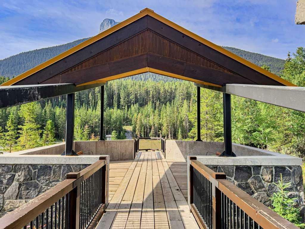 Property Photo:  106 Stewart Creek Landing 205  AB T1W 0G6 