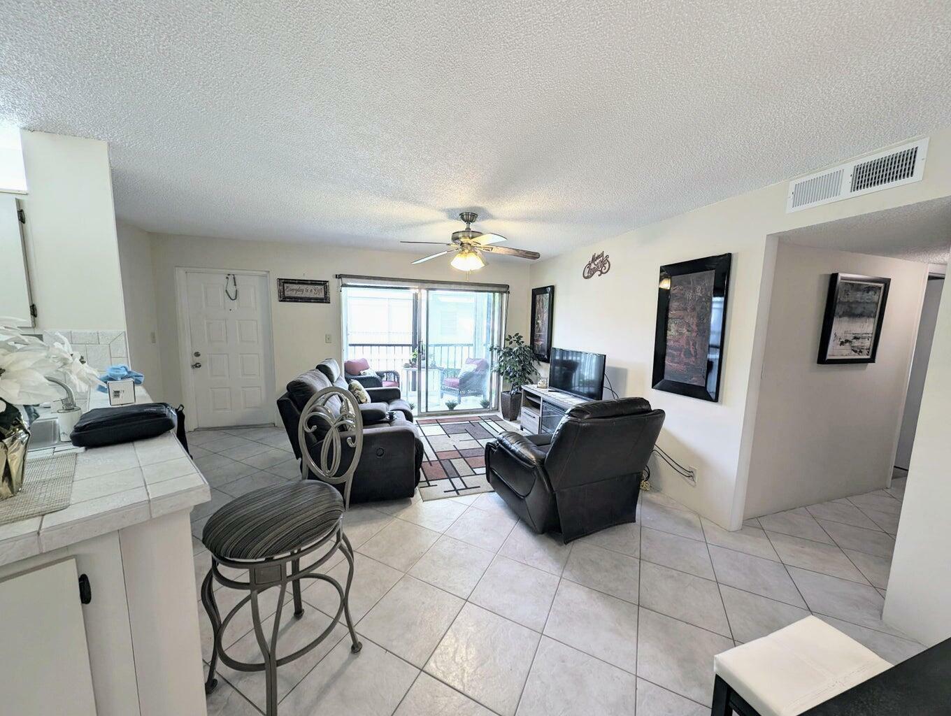 Property Photo:  7515 S Oriole Boulevard S 203  FL 33446 