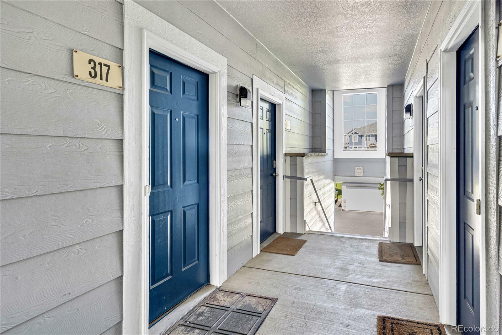 Property Photo: 5255 Memphis Street 317 CO 80239