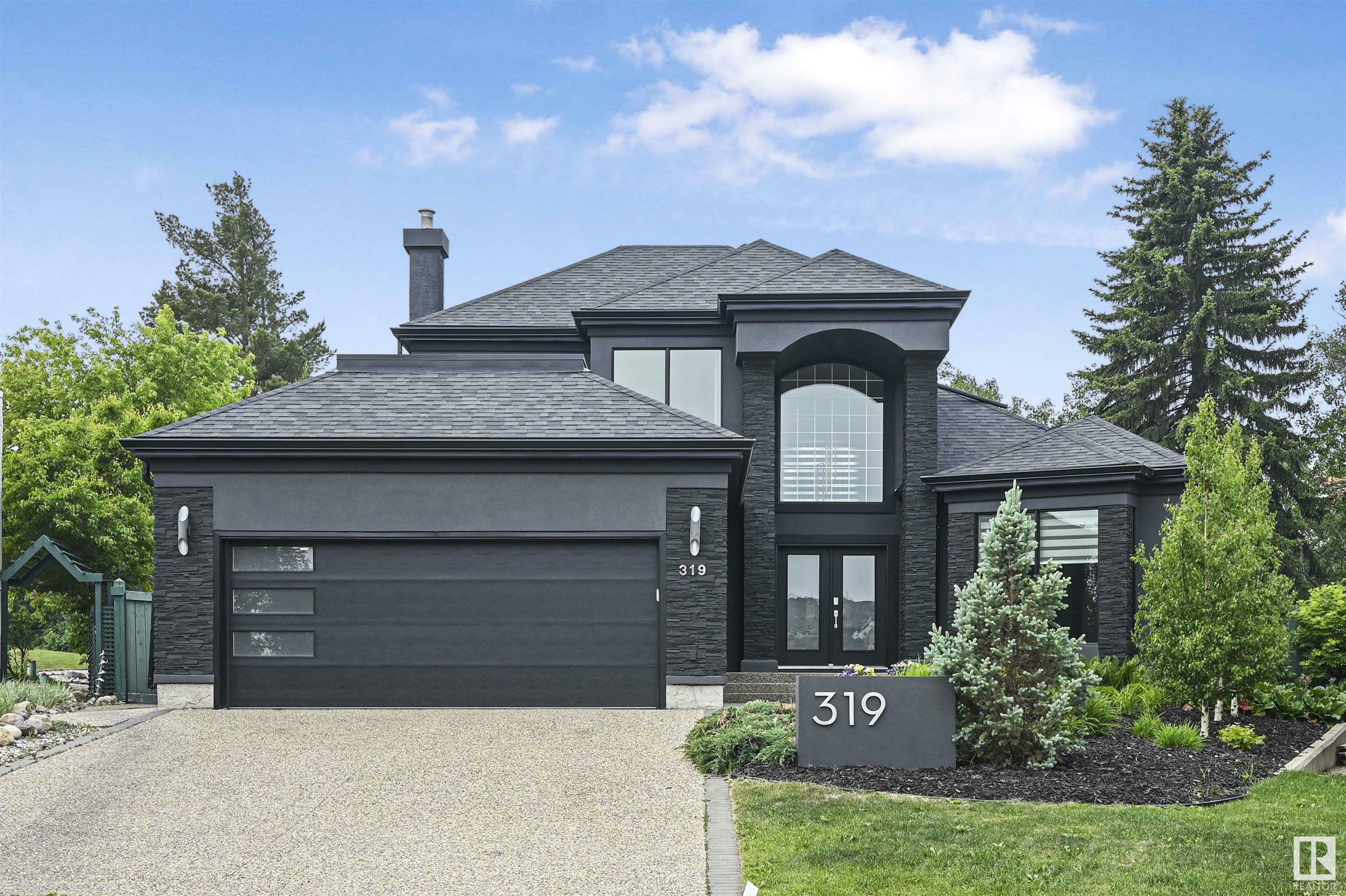 Property Photo: 319 Ferris Way NW AB T6R 2C4